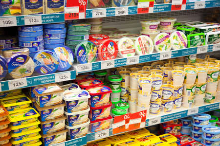 Kaliningrad, Russia - January 31, 2021: Cheese on supermarket shelves.のeditorial素材