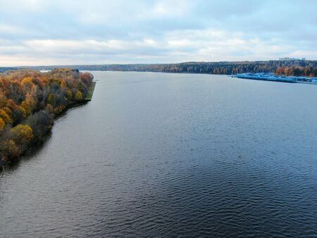 Aerial view of the landscape is a beautiful river at sunset in summer in clear weather.