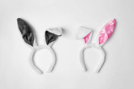 Top view of two rabbit ears on white background pink and couple love holiday easter conceptの写真素材
