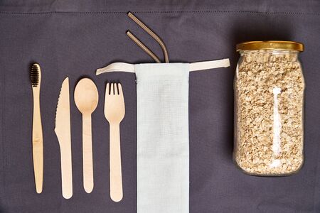 Set of Eco friendly bamboo cutlery, eco bag, metal straw. Sustainable. Plastic free.の写真素材