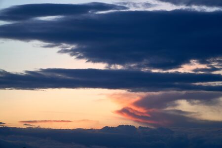 Fiery orange and blue sunset sky. Beautiful sky. Background nature. Life