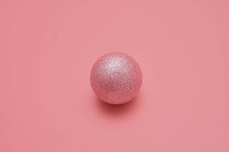Pink background with pink balls. Christmas flay lay. Top viewの写真素材