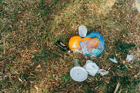 plastic bag in grass. Ecology problem. Summerの写真素材