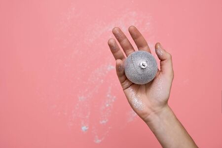 Woman hand in glitter. Hand made christmas tree balls. Diy craft. Holiday season
