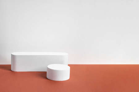 concrete podium on earthy tone background. Pedestal, place for productの写真素材