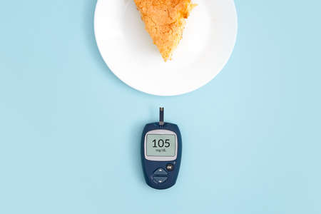 Healthy lifestyle concept. Health care. Medical diabetes meter equipment. Top view of glucose blood test. World diabetes health day.の写真素材