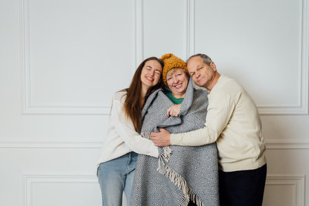 Nice portrait of family with elderly mature woman, man and millennial daughter