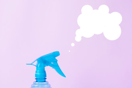 Home gardening spray bottle for plants. Spring cleaning conceptの写真素材