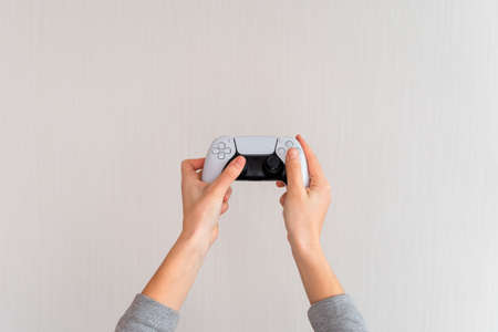 Videogame console wireless gamepad. white lifestyle background. Minimal style. Modern leisure at...