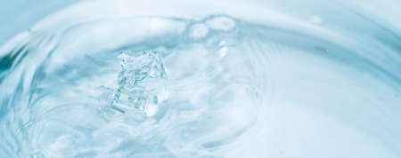 Abstract water background for wallpaper design. Liquid gel texture. Abstract bright wallpaper. Clear transparent cosmetic texture.の写真素材