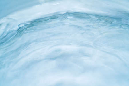 Abstract water background for wallpaper design. Liquid gel texture. Abstract bright wallpaper. Clear transparent cosmetic texture.の写真素材