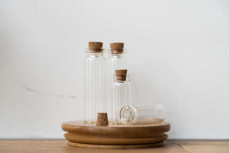 Reusable cosmetics with refill packing. Sustainable business, eco-friendly circular economy. Glass bottles, small reusable bottles for cosmeticsの写真素材