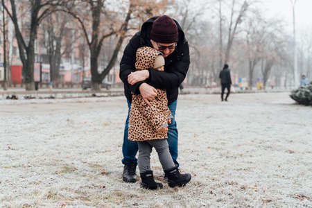 Father playing with child outdoors. Happy parenting, family bond. Toddler preschool girl daughter...