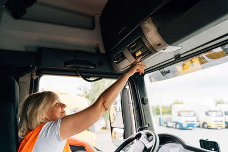 Middle age truck driver woman, trucker occupation in Europe for females