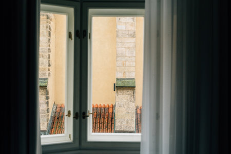 Window view from old European building in Prague