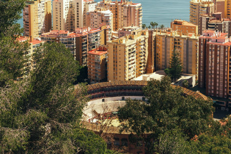 Plaza de Toros and Urban Skyline in Malaga, Spainの写真素材