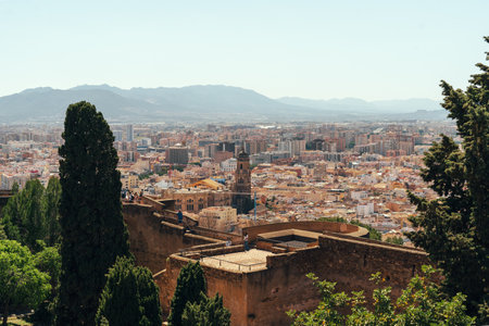 Scenic cityscape view with historical architecture under a bright sky.の写真素材