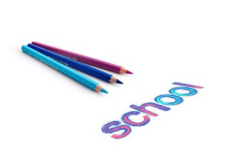 Color pencils with  inscription 'school' isolated on white.の写真素材