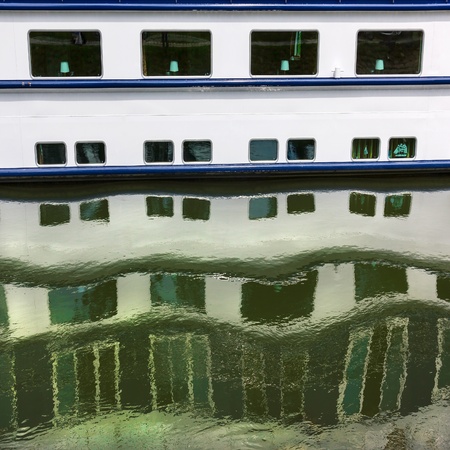 Rhythm of ship windows with their water reflections  Natural pattern の写真素材