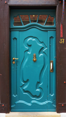 Front door of a medieval building in Bremen, Germany.のeditorial素材
