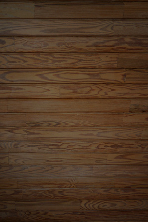 Wooden batten wall texture. Natural brown background.の写真素材