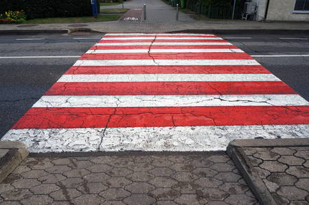 Crosswalk. Red and white pedestrian crossing marking.の写真素材