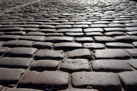 Ancient old stone sett paving.の写真素材