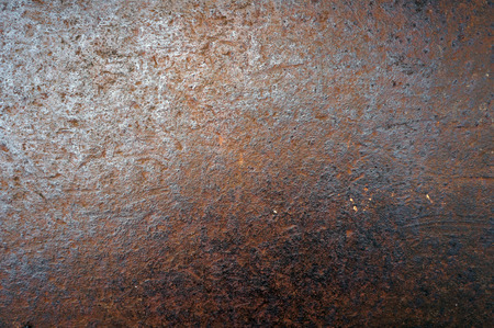 Rusty metal surface.  Abstract brown textured background.
