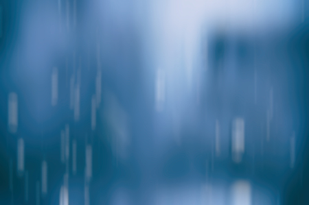 Raining. Abstract blue winter background.の写真素材