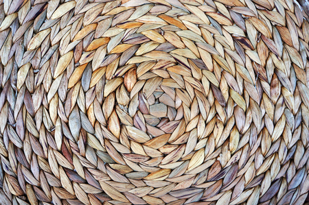 Wicker basket bottom. Spiral pattern. Textured background.の写真素材
