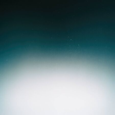 Retro photographic film effect. Abstract vintage gradient background. Blue, turquoise and aqua...