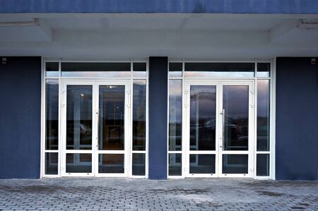 Glass doors of entrance in modern building.               