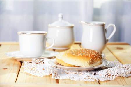 Fresh burger buns with sesame for breakfast at bright sunny morning.の写真素材