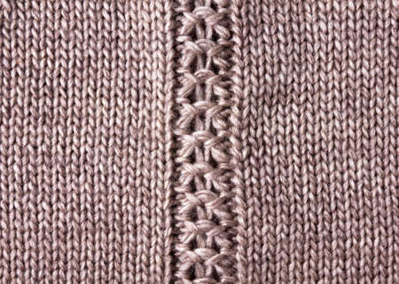Merino wool handmade knitted fabric texture.