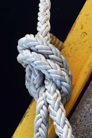 Closeup of mooring rope knot.