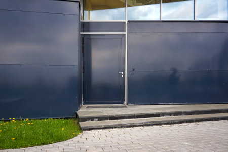 Closed Entrance Door on Facade of Modern Building.の写真素材