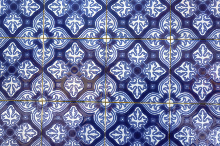 Azulejo - Traditional Glazed Tile on Walls of Portuguese Buildings - in Aveiro, Portugal.  Floral Blue and White Pattern.の写真素材