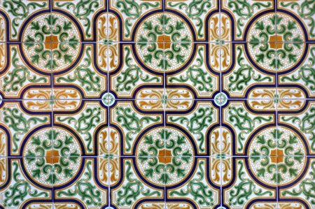 Azulejo Tile on Wall of a Building in Aveiro, Portugal. Floral Green, Yellow and White Pattern.の写真素材