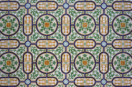 Azulejo Tile on Wall of a Building in Aveiro, Portugal. Floral Green, Yellow and White Pattern.の写真素材
