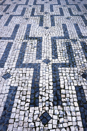 One of Geometric Patterns in Traditional Mosaic Paving Tiles in Braga, Portugal.の写真素材