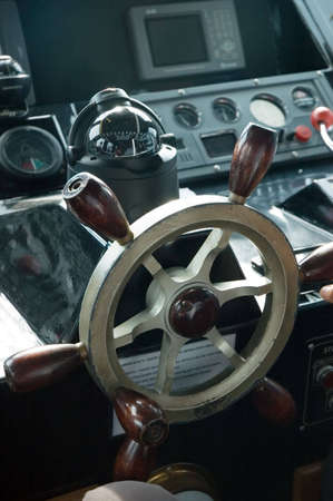 steering and dash board in a boat control roomの写真素材