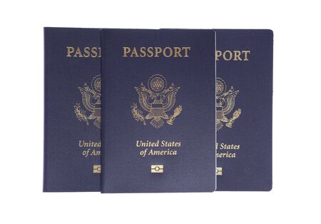 Three US Passports on white isolated background