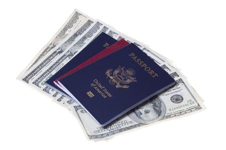 US and Russian passports with stack of US 100 dollars billsの写真素材