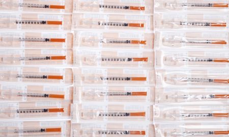 Lots of syringes for insulin の写真素材