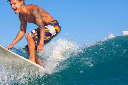 picture of surfing a wave in Indonesia.