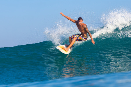 picture of surfing a wave in Indonesia.の写真素材