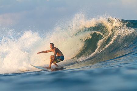 Picture of Surfing a Wave.Sumbawa Island. Indonesia.の写真素材