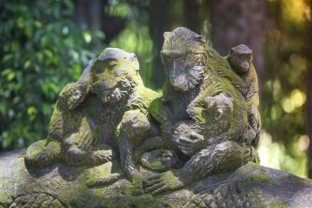 Figure of Long  Tailed Macaque with her Infant , Sacred Monkey Forest, Ubud. Bali, Indonesiaの写真素材