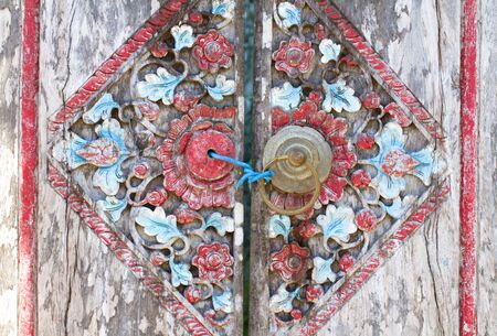 old wooden door and stone wallの写真素材