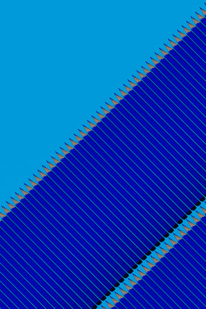 Pattern of dark blue pencils at blue background